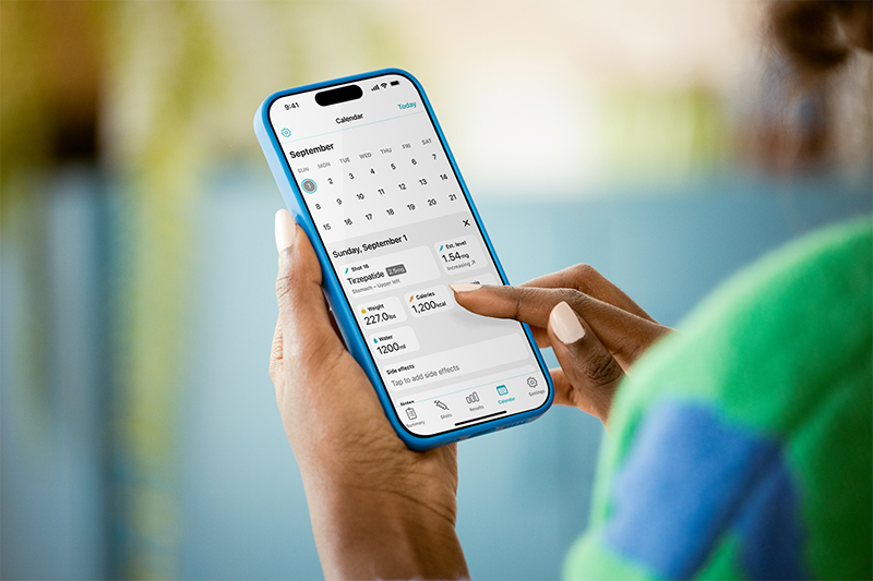 Person using a health‑tracking app on a smartphone