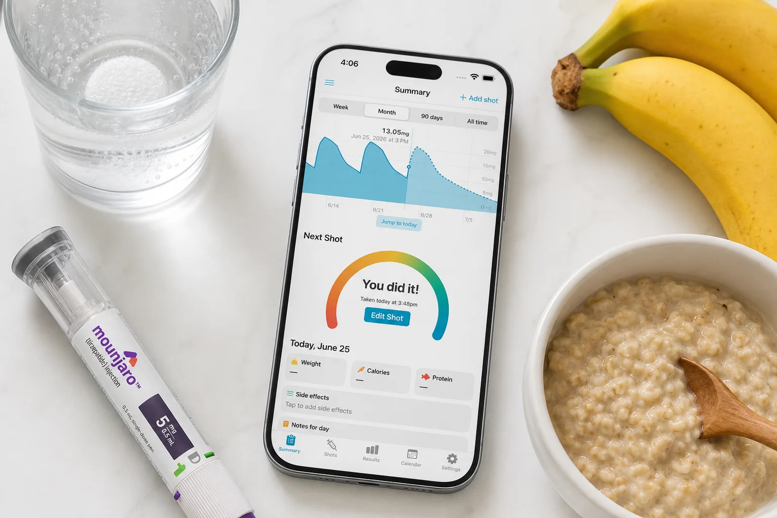 Shotsy app on a phone beside a GLP-1 injection pen, glass of water, bananas, and a bowl of oatmeal on a white countertop